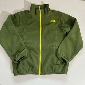 The North Face boys  full-zip fleece jacket in green with a neon yellow zipper.
